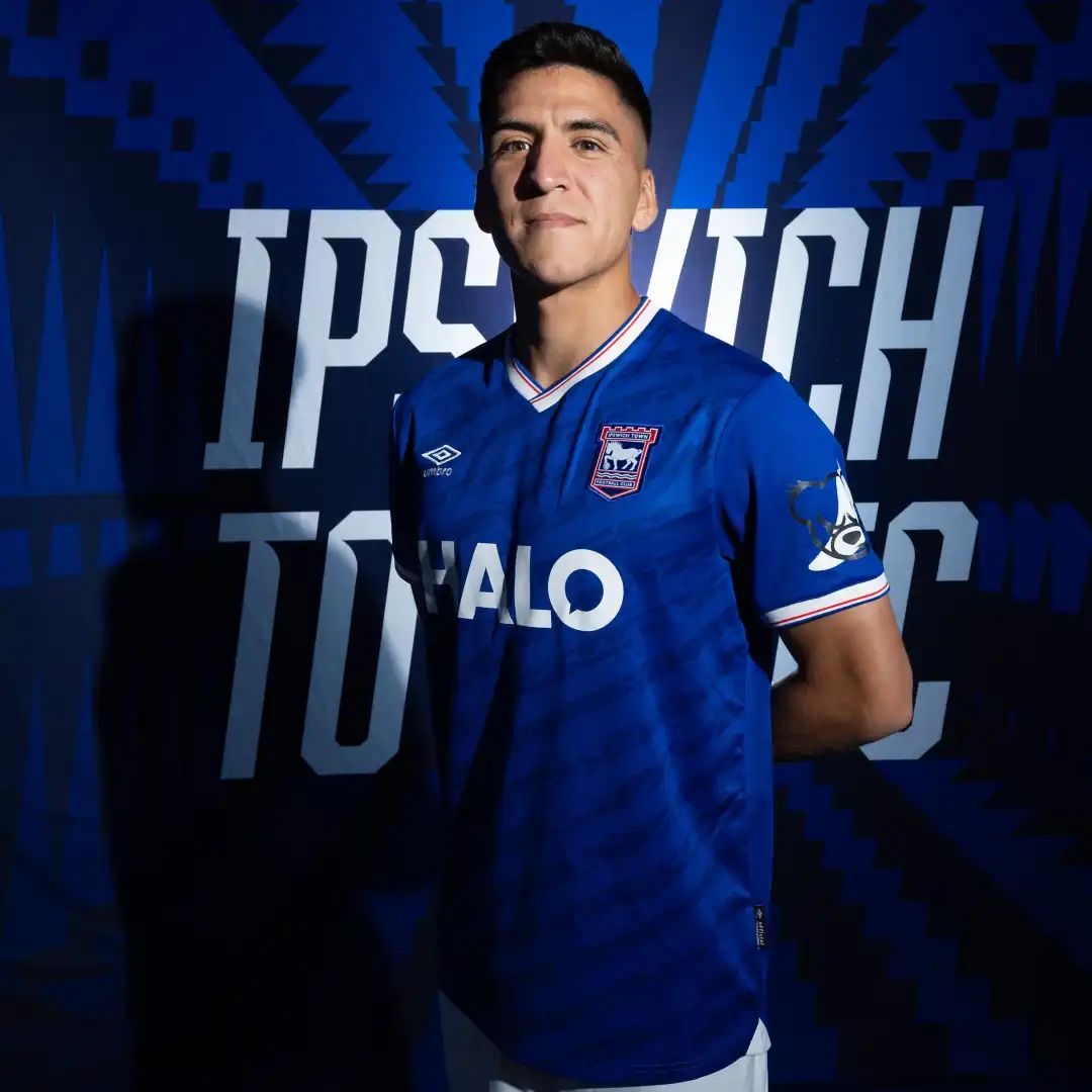 Ipswich Town football player shooting a ball